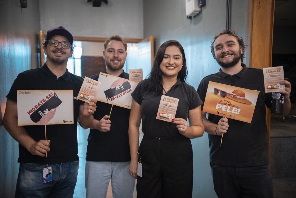 Colaboradores da Cetro participando da Campanha Dezembro Laranja.