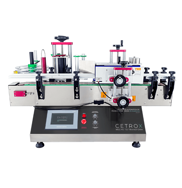 Fotografias da Rotuladora Automática de Frascos Cilíndricos de Bancada CALM T e da Mesa Rotativa Acumuladora CRT A 500 T, que compõem a linha de produção para body splash da CetroX.
