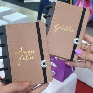 Fotografias dos brindes personalizados e do espaço do evento corporativo Brazil Promotion e seus visitantes.
