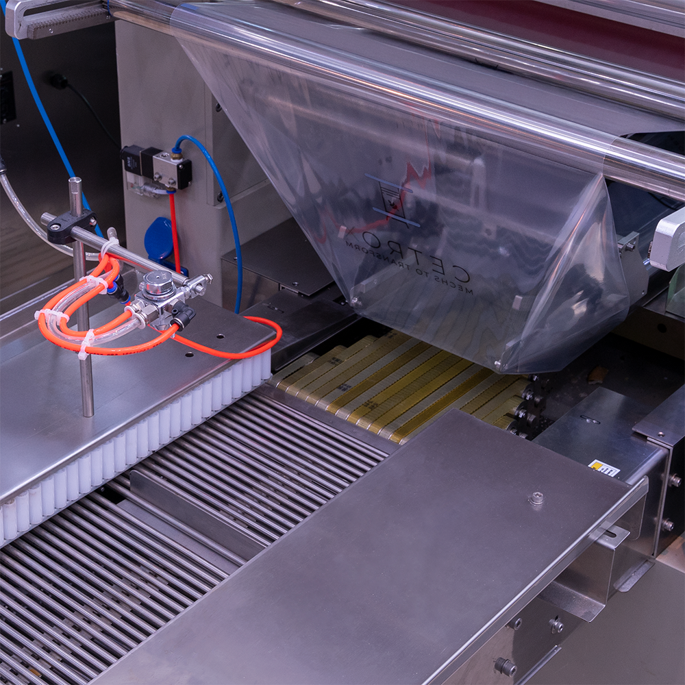 Partes da estrutura da Flow Pack Convencional com Fatiadora Automática de Pães com NR12 CAPM FP-700 S AF da CetroX.